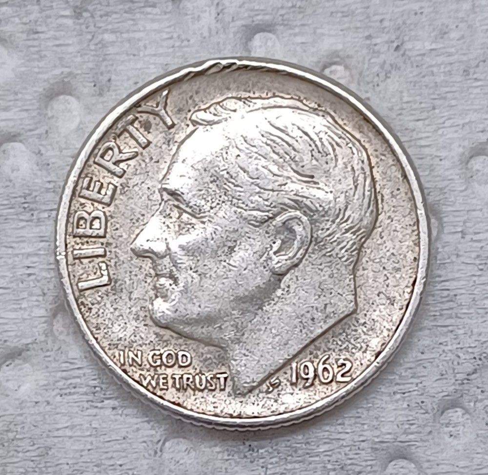 1962-D-Roosevelt-Dime-Die-Gouges-Or-Feeder-Finger-Damage-On-Inside-Portion-Of-The-Rim-On-Obverse?